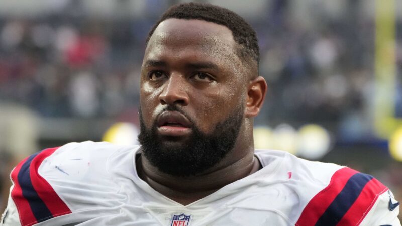 Davon Godchaux looks on