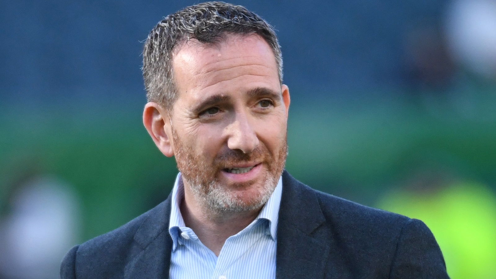 Howie Roseman looks on