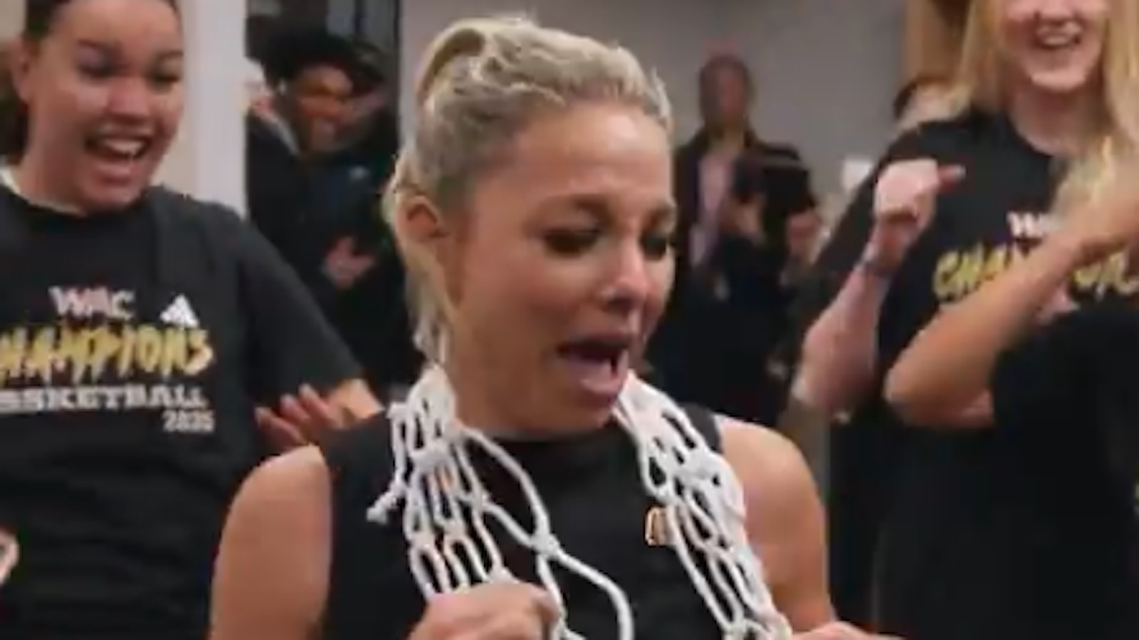 Molly Miller celebrates in the locker room
