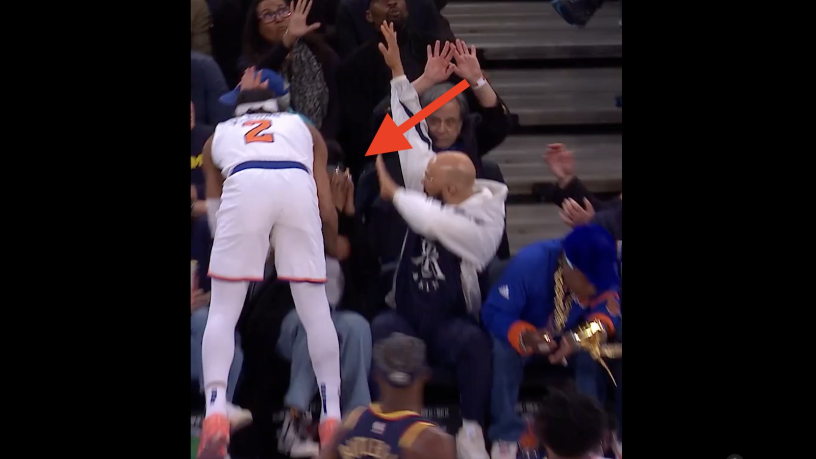 Knicks guard Deuce McBride crashing into Jennifer Hudson