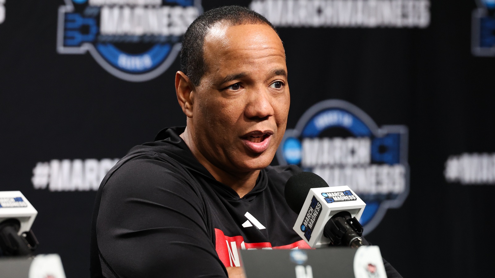 Kevin Keatts giving a press conference
