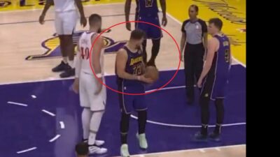 Luka Doncic holds a ball