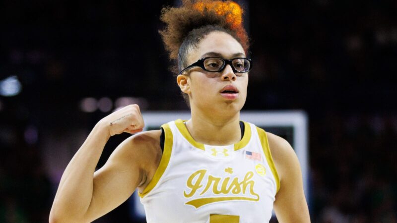 Olivia Miles flexing