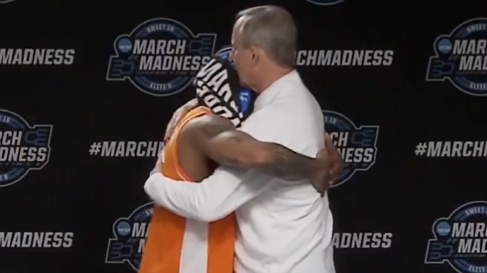 Rick Barnes and Zakai Zeigler embrace