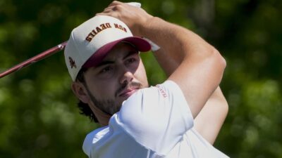 Jose Luis Ballester poses after a shot