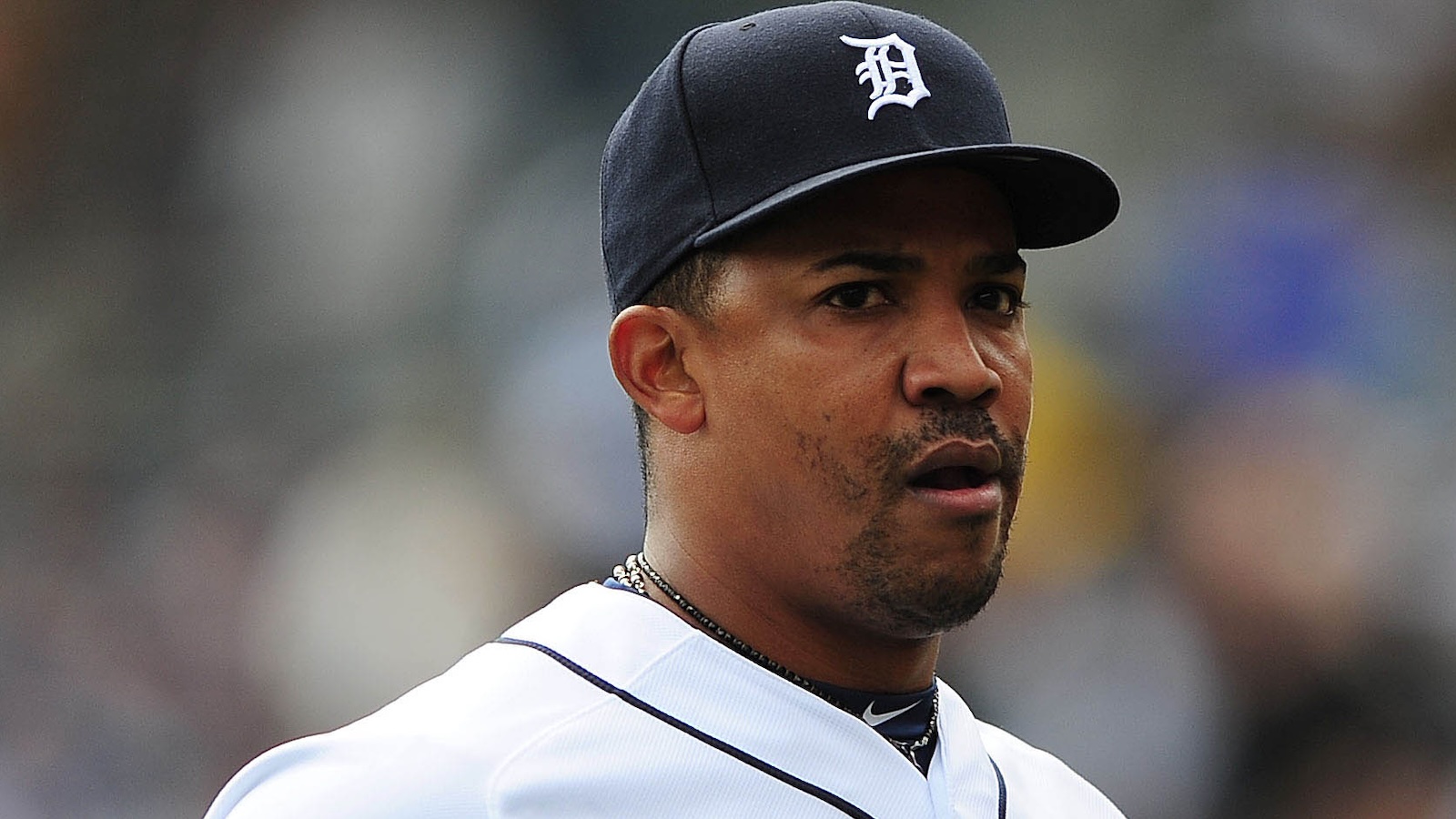 Octavio Dotel looks on