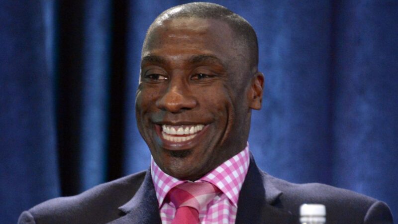 Shannon Sharpe smiles