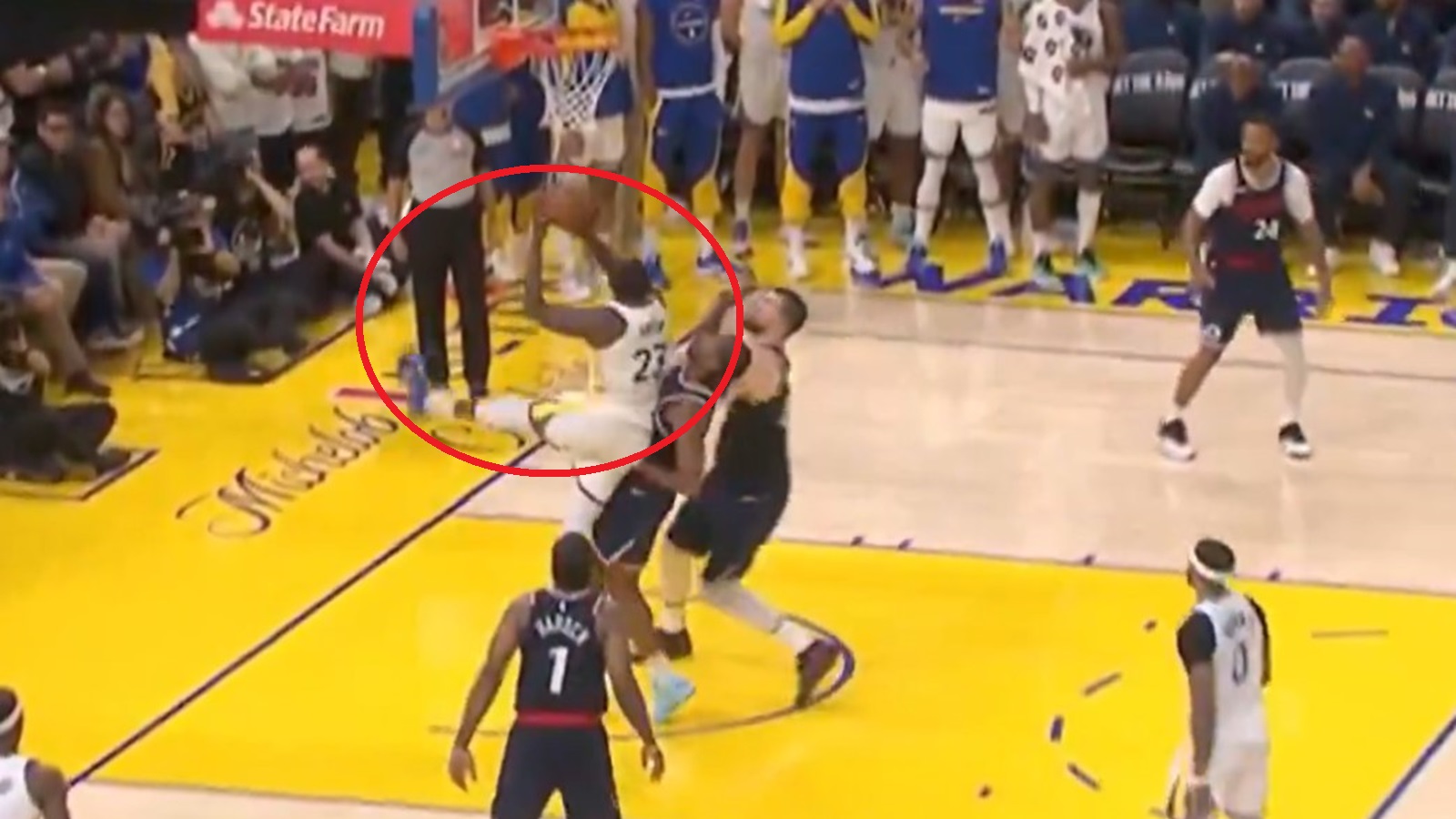 Draymond Green attempting a layup