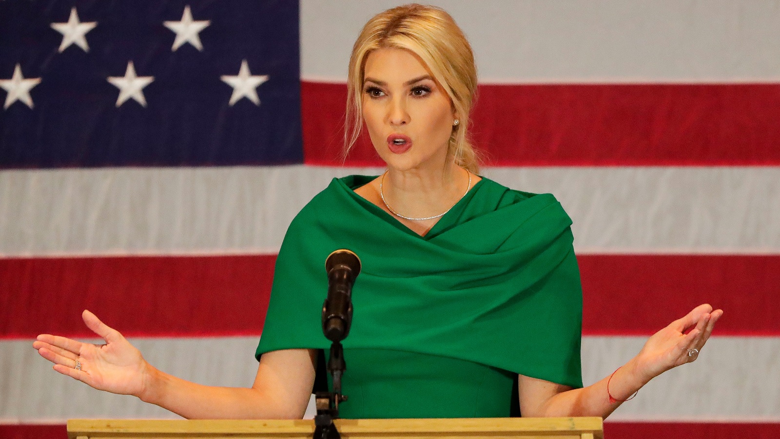 Ivanka Trump in a green dress