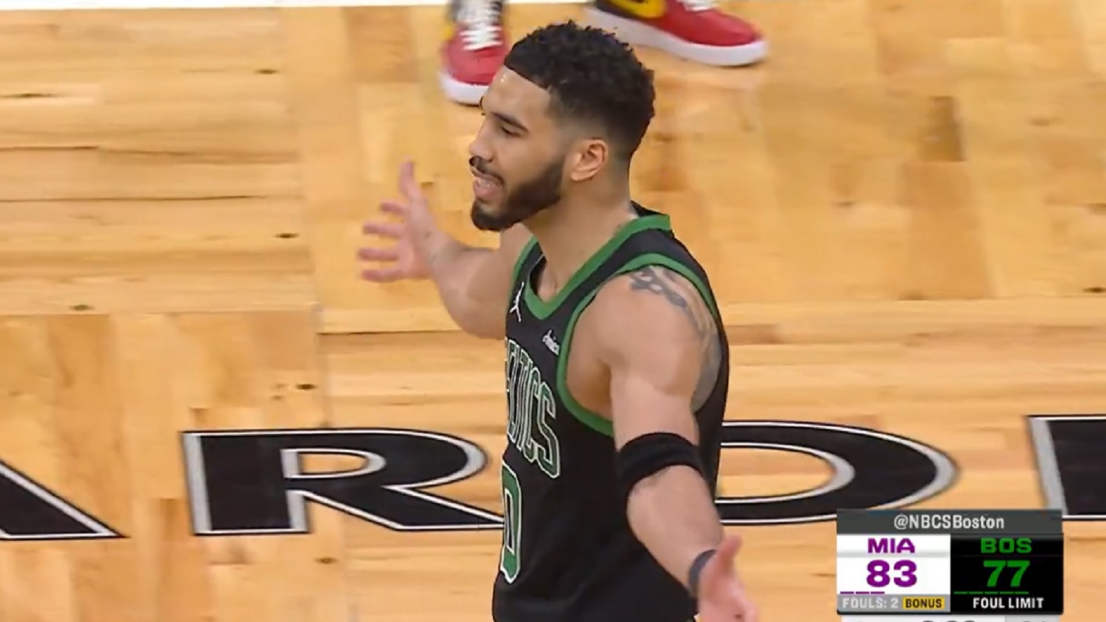 Jayson Tatum with his arms open