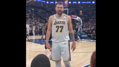 Luka Doncic talking to a fan