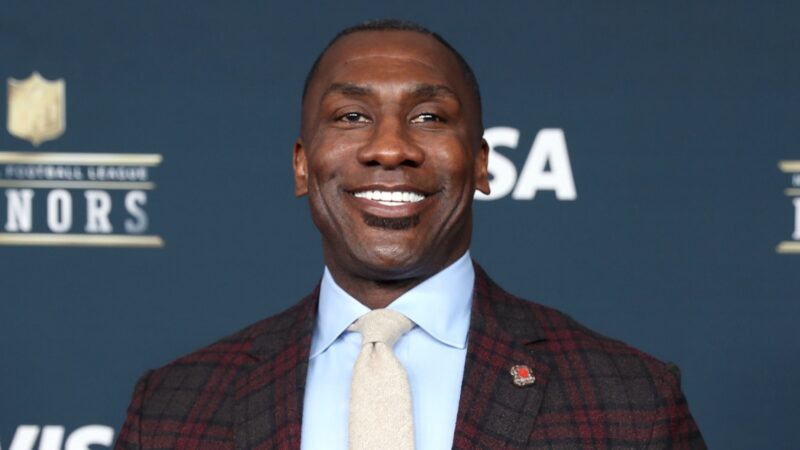Shannon Sharpe posting for a photo