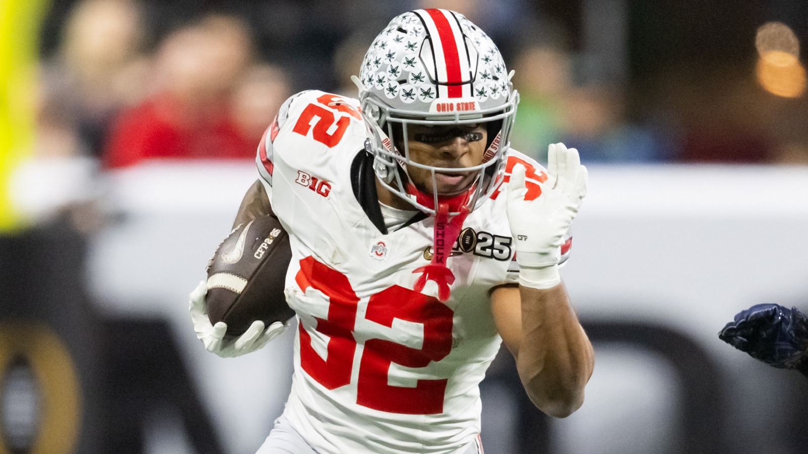 TreVeyon Henderson running with the ball