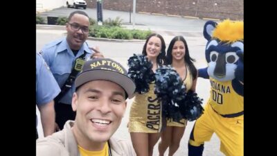 Pacers fan Hans Perez poses for a photo