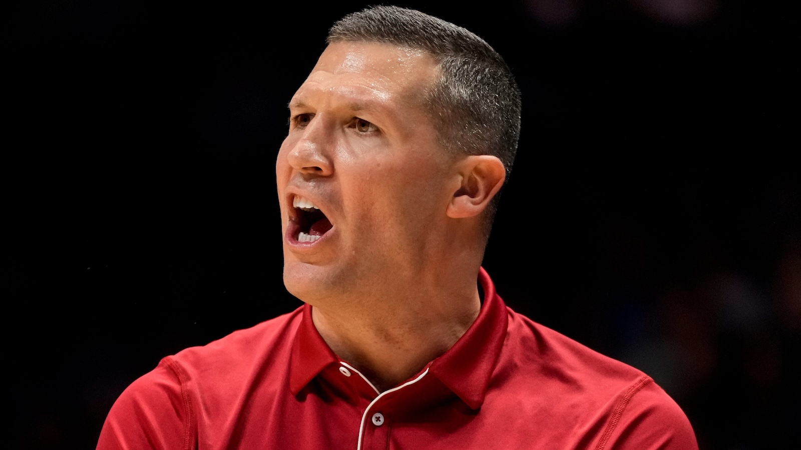 Paul Corsaro shouts from the bench area