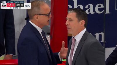 Paul Maurice talks with Rod Brind'Amour