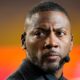 Ryan Clark looks on