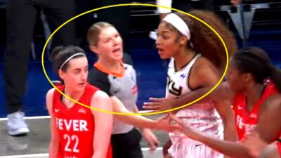 Angel Reese yelling at Caitlin Clark