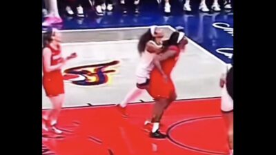 Caitlin Clark and Angel Reese waiting for a rebound