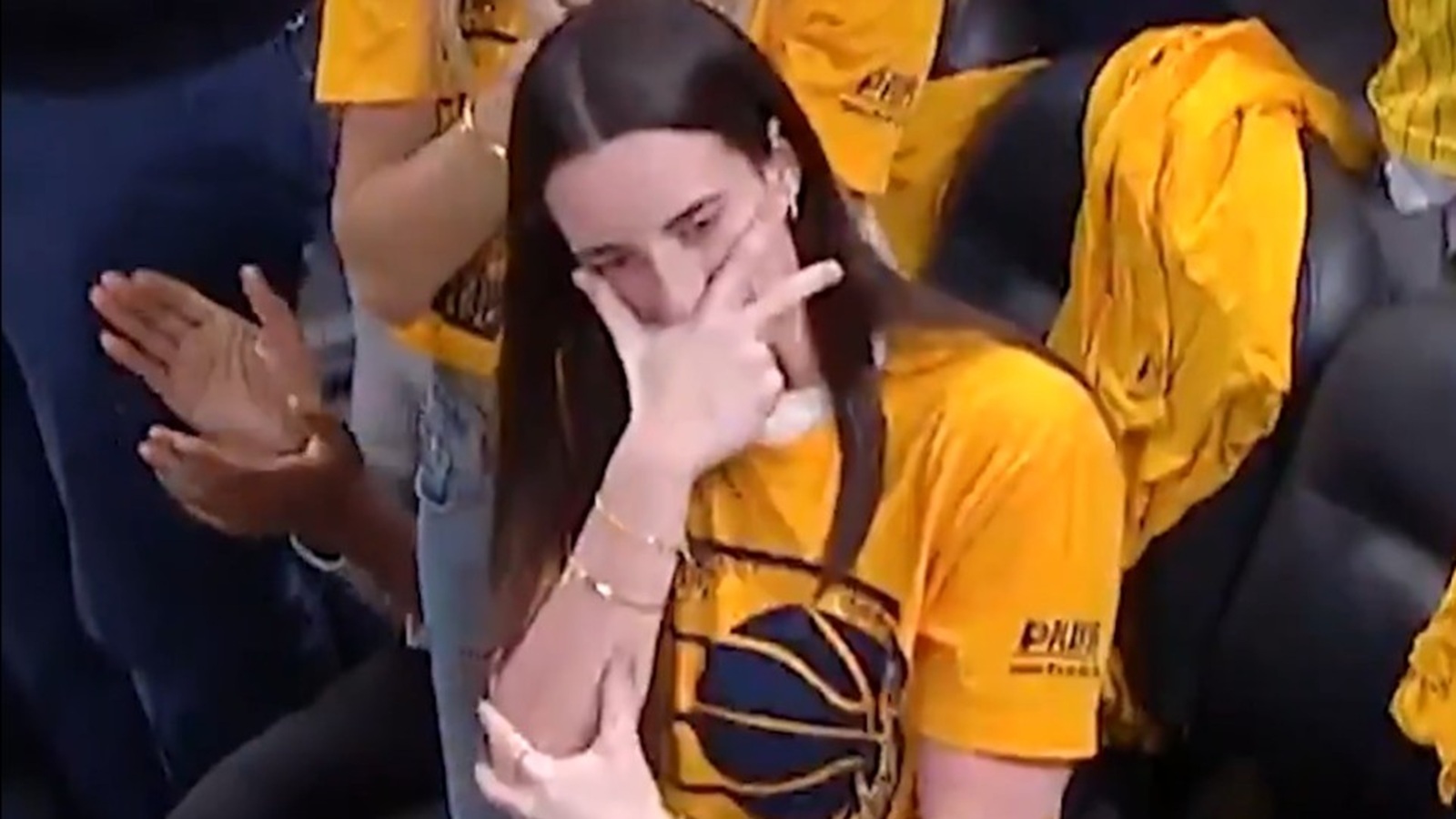 Caitlin Clark doing Jalen Brunson's celebration