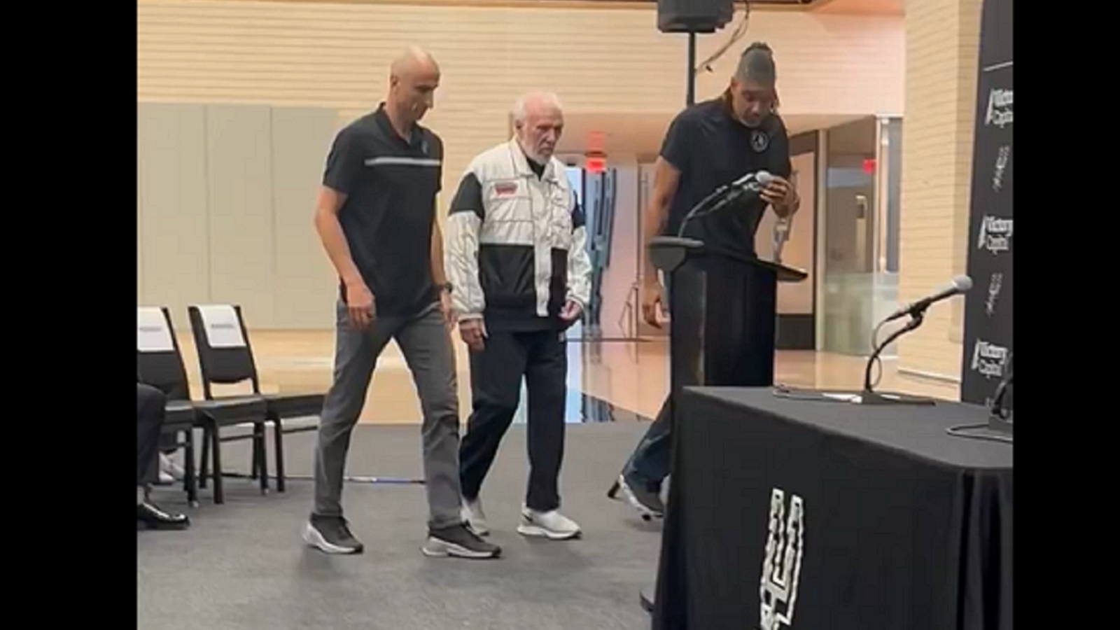 Gregg Popovich walking