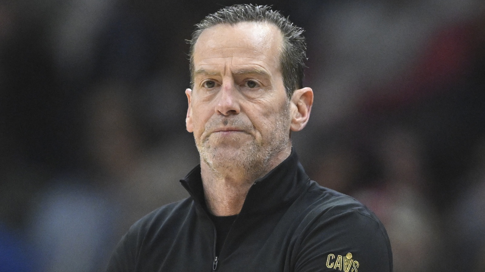 Kenny Atkinson looking on during a game