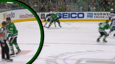 Mason Marchment hitting a referee with his stick