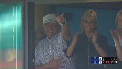 Roger Clemens watches his son homer