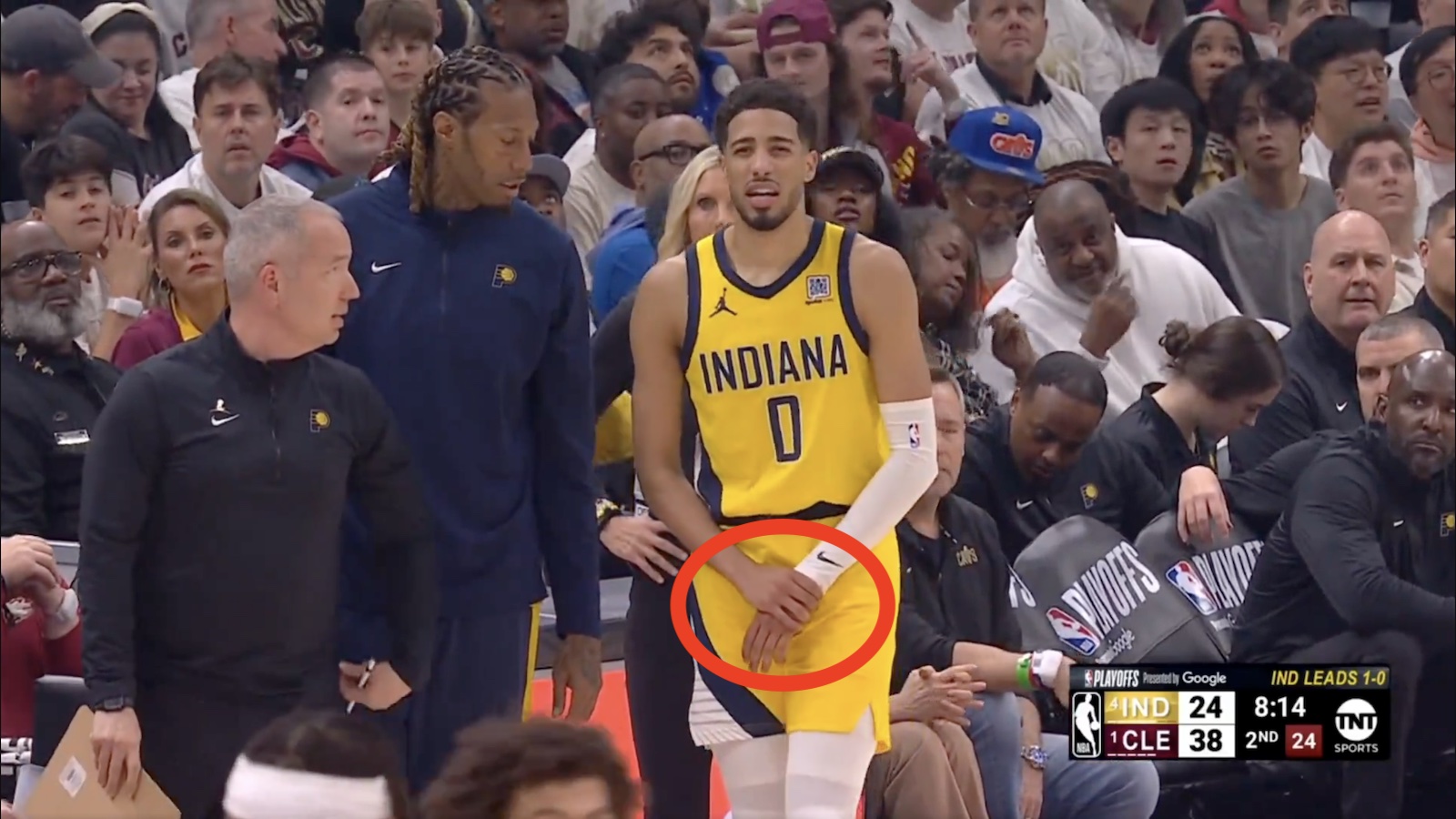 Pacers star Tyrese Haliburton holding his left wrist due to injury