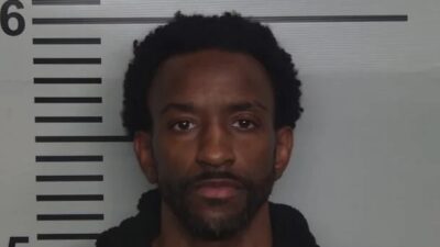 Russ Smith poses for a mugshot
