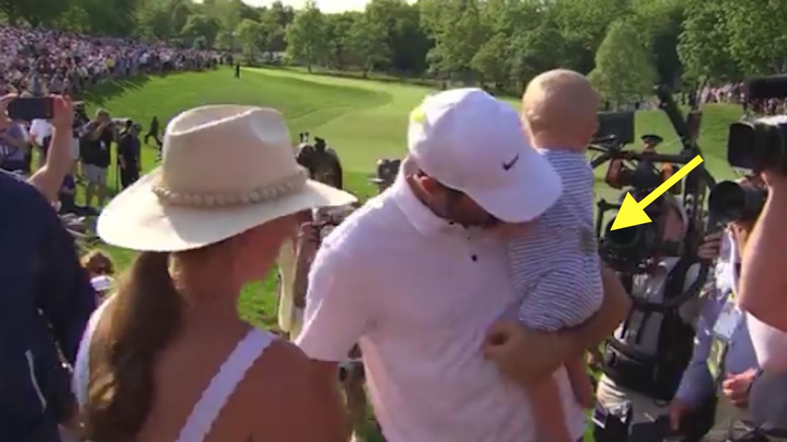 Scottie Scheffler holds his son Bennett