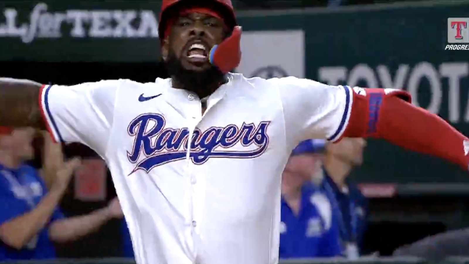 Adolis Garcia with a huge pimp job after hitting a home run