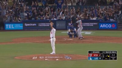 Clayton Kershaw doing the wave with fans