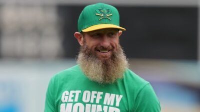 Dallas Braden smiling on a baseball field