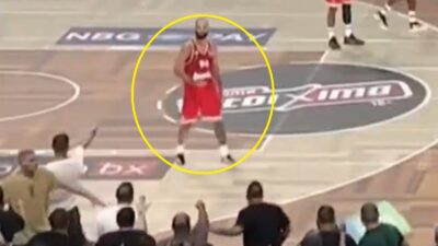 Evan Fournier making an obscene gesture towards fans