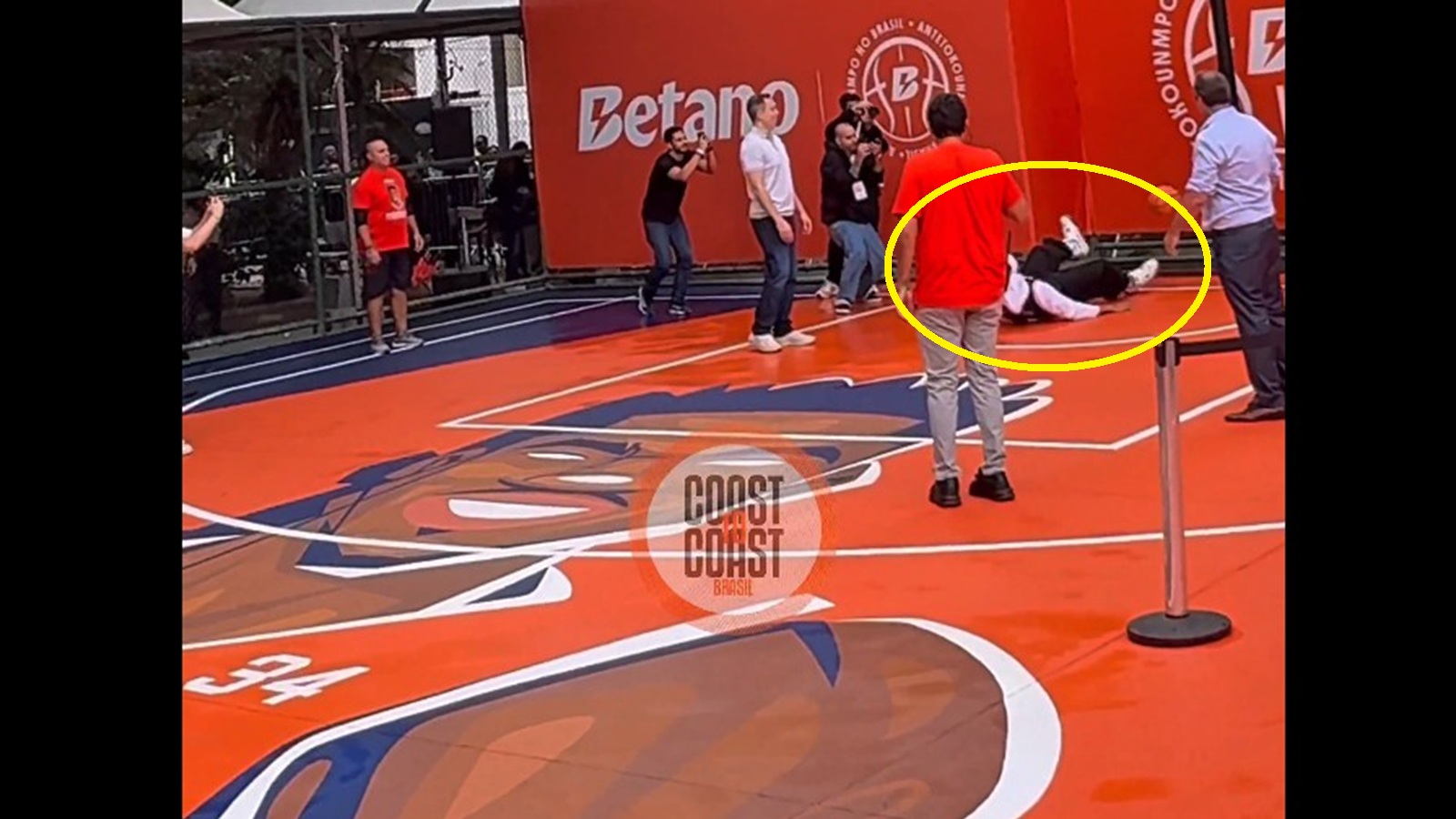 Giannis Antetokounmpo falling to the ground