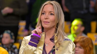 Jeanie Buss sitting courtside
