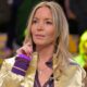 Jeanie Buss sitting courtside