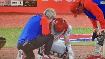 JT Realmuto hunched over in pain