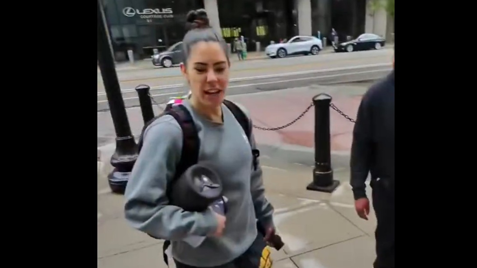 Kelsey Plum standing outside of her team hotel