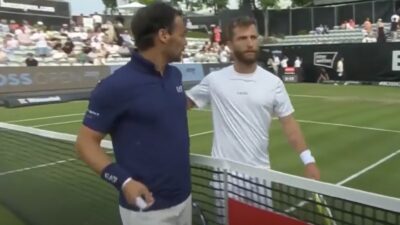 Fabio Fognini and Corentin Moutet shake hands