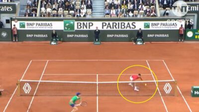 Novak Djokovic stretches for the ball