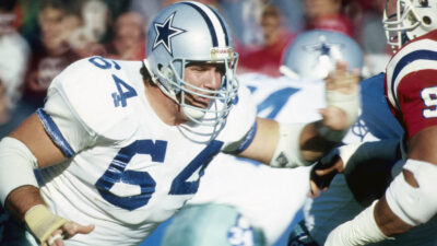 Cowboys legend Tom Rafferty prepares to block