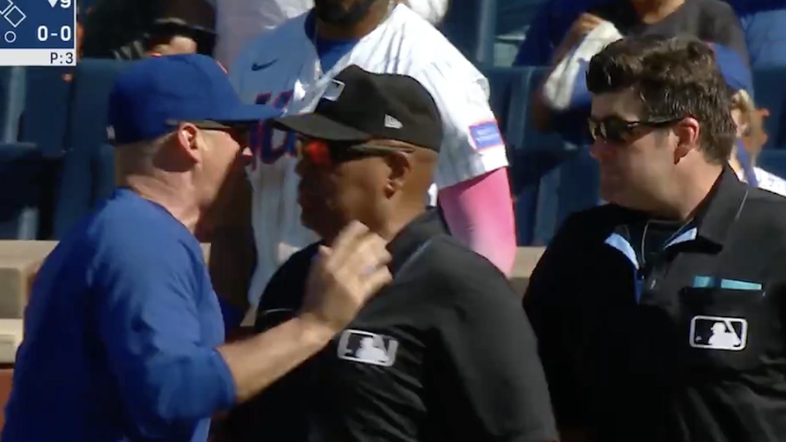 Carlos Mendoza screams at the home plate umpire