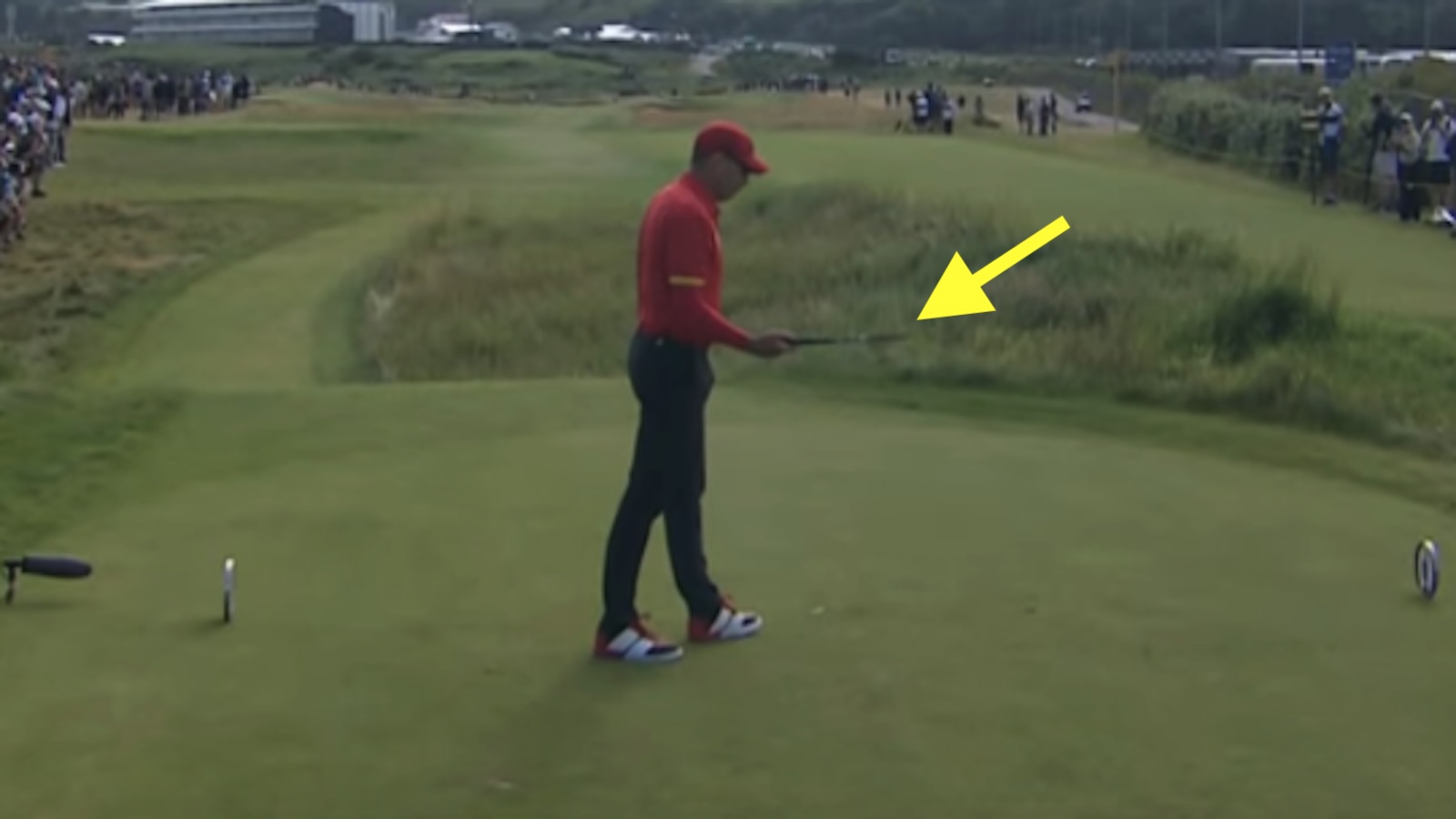 Sergio Garcia looks down after snapping his driver