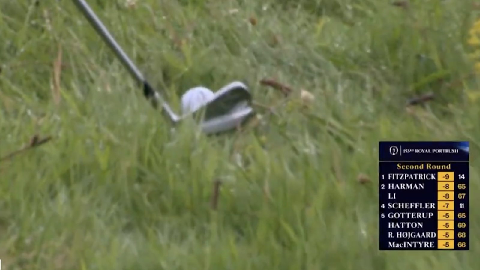 Shane Lowry addresses a ball in the rough