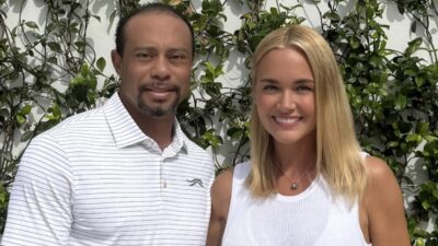 Tiger Woods poses with Vanessa Trump