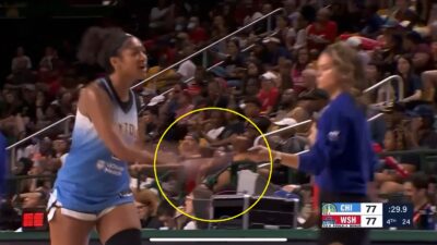 Angel Reese clipboard slap