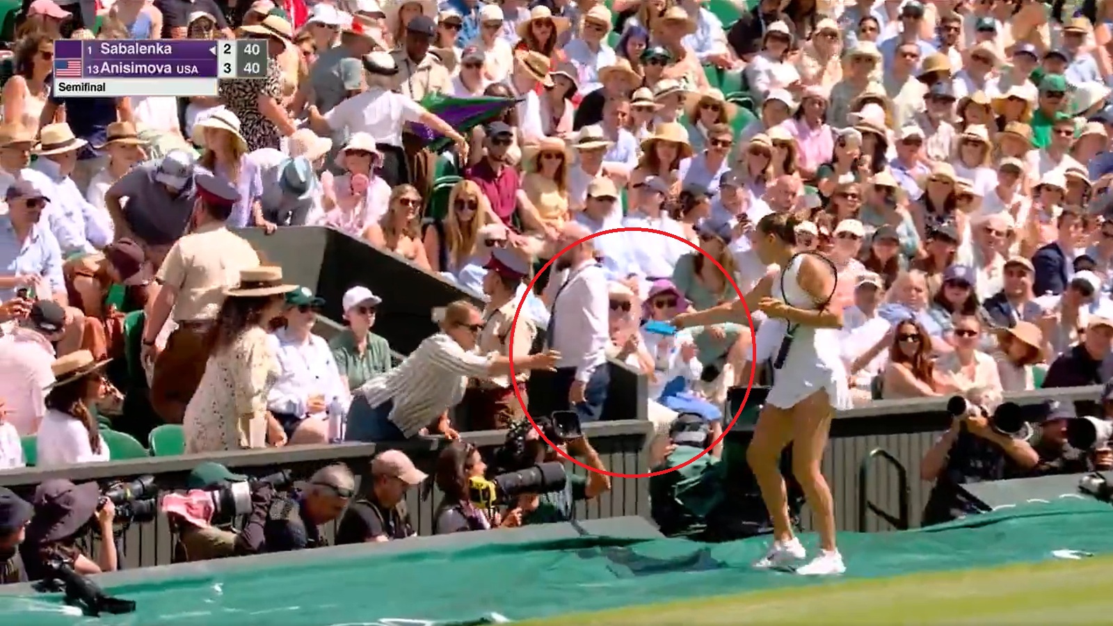 Aryna Sabalenka delivering water