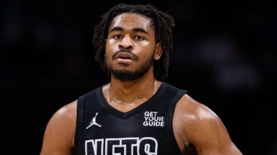 Cam Thomas looking on during a game